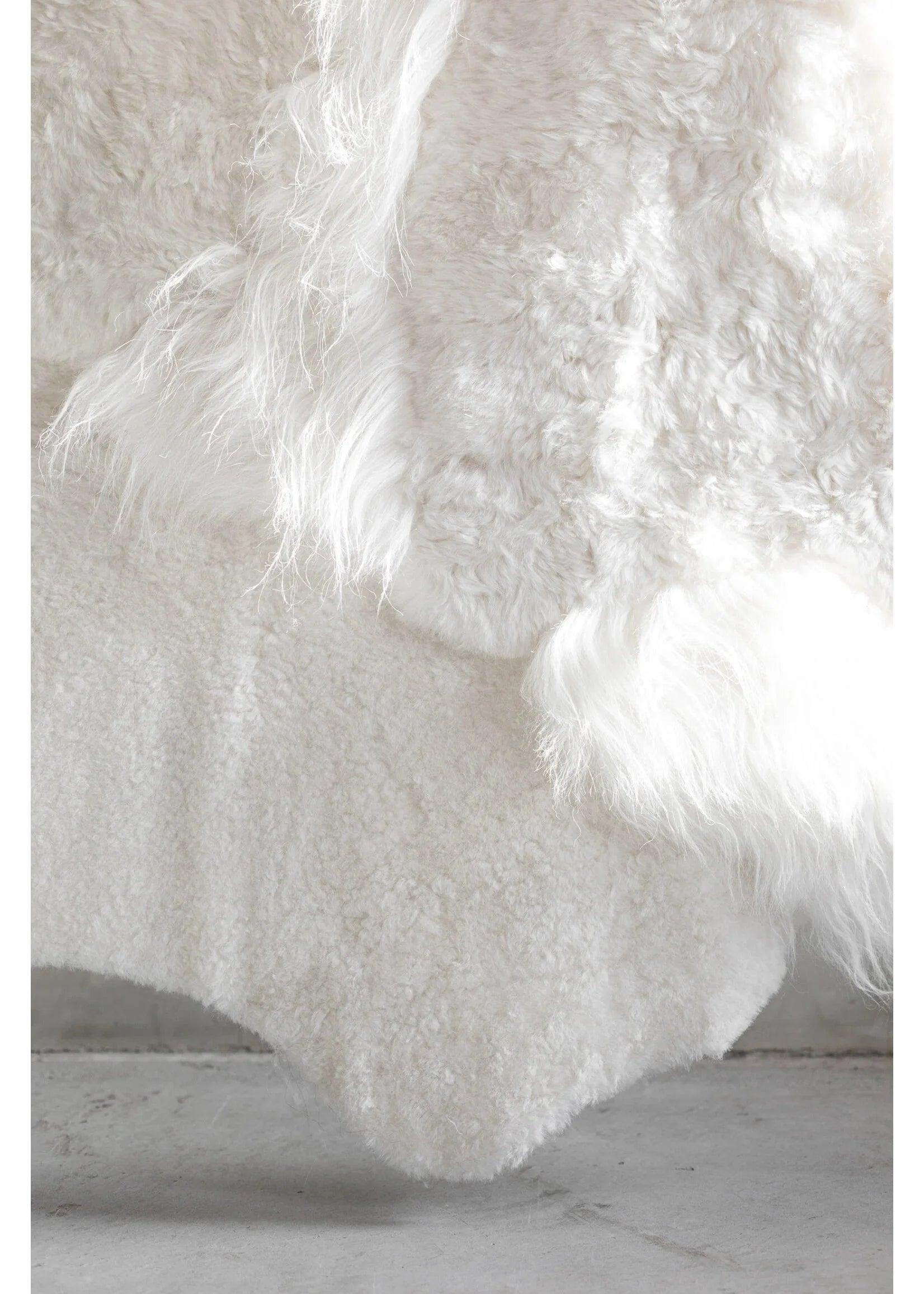 Islandsk lammeskinds tæppe - hvid (Str. 180x120 cm) Lammeskind Uldplaiden.dk